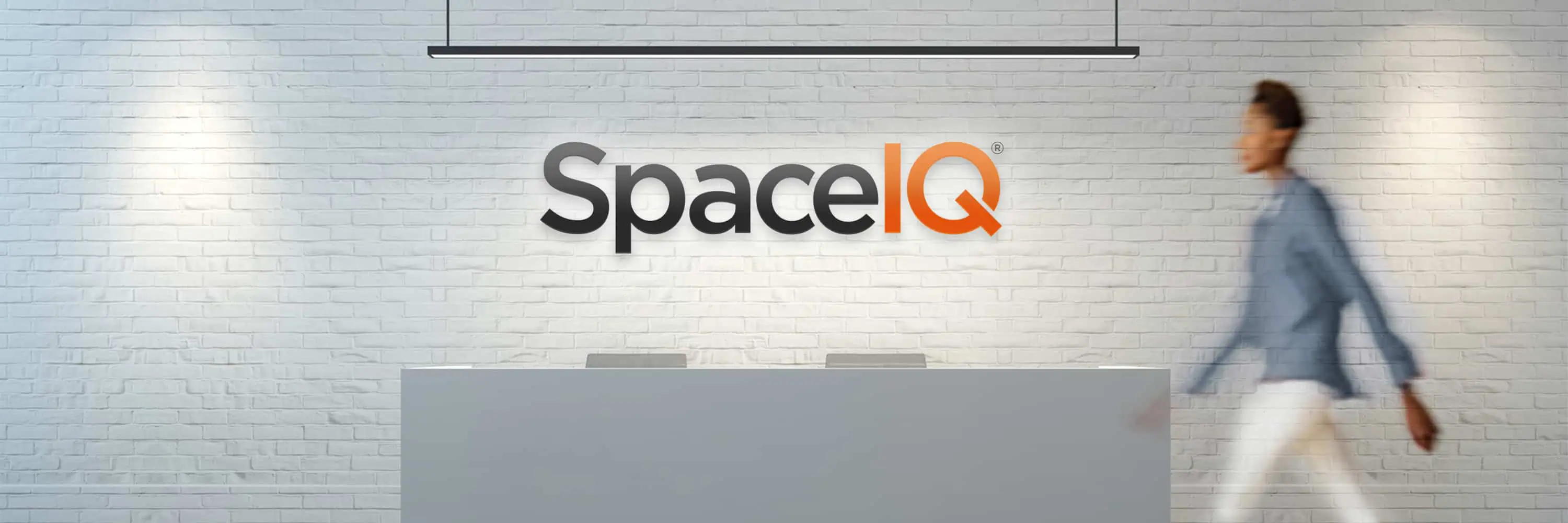 SpaceIQ logo office signage.